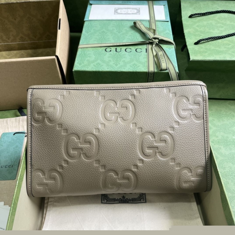 G*u*i clutch bags